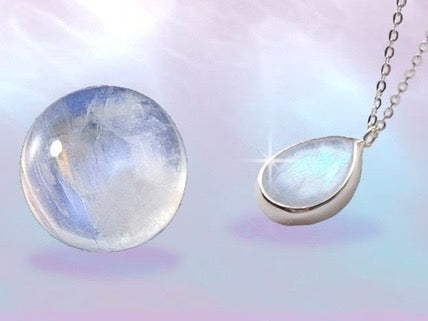 Two moonstone necklaces on a dreamy background