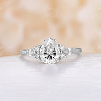 Pear Moissanite Cluster Engagement Ring Rose Gold