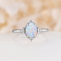 Celestial Oval Natural White Opal Rose Gold Engagement Ring