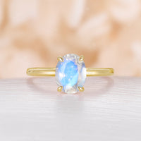 Classic Solitaire Oval White Opal Engagement Ring Rose Gold