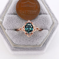 Oval Shape Teal Sapphire Engagement Ring Celtic Knot Rose Gold Band