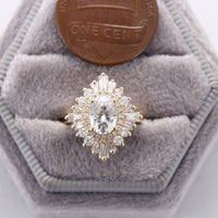 Art deco Oval Moissanite Starburst Halo Engagement Ring Yellow Gold