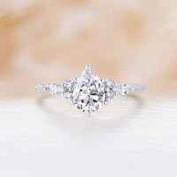 Pear Moissanite Twist Engagement Ring Cluster Rose Gold