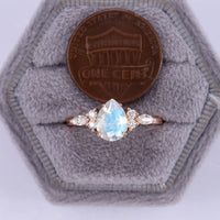 Pear Shape Blue Moonstone Classic Cluster Engagement Ring Rose Gold