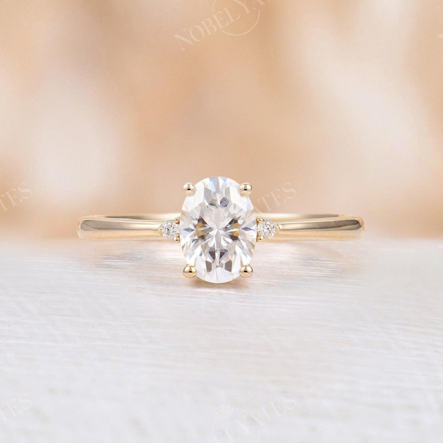 
                  
                    Oval Moissanite Rose Gold Three Stone Ring
                  
                