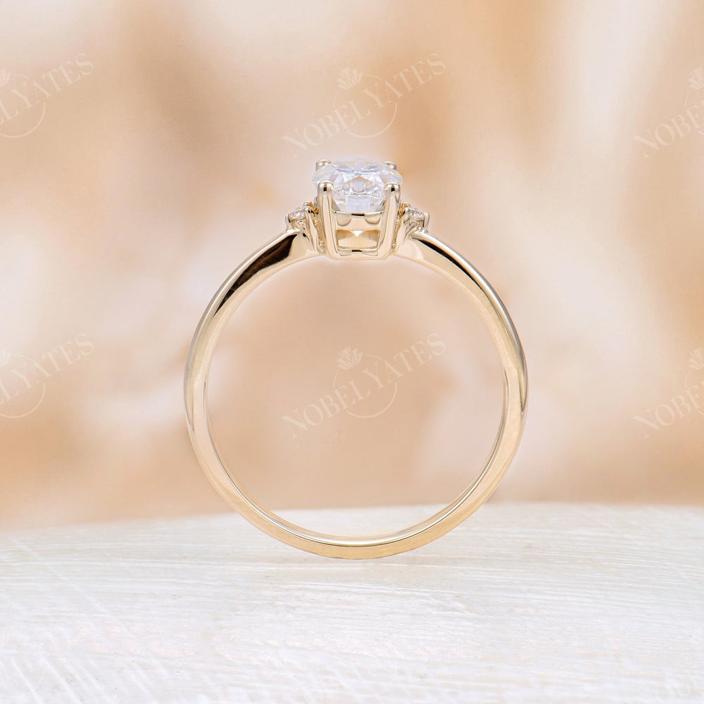 
                  
                    Oval Moissanite Rose Gold Three Stone Ring
                  
                