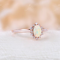 Vintage Oval White Opal Rose Gold Halo Engagement Ring