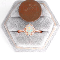 Celestial Oval Natural White Opal Rose Gold Engagement Ring