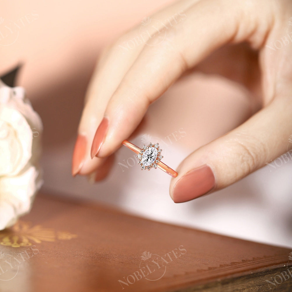 
                  
                    Oval Moissanite Halo Rose Gold Engagement Ring
                  
                