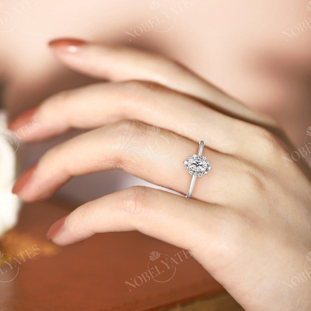 
                  
                    Oval Moissanite Halo Rose Gold Engagement Ring
                  
                