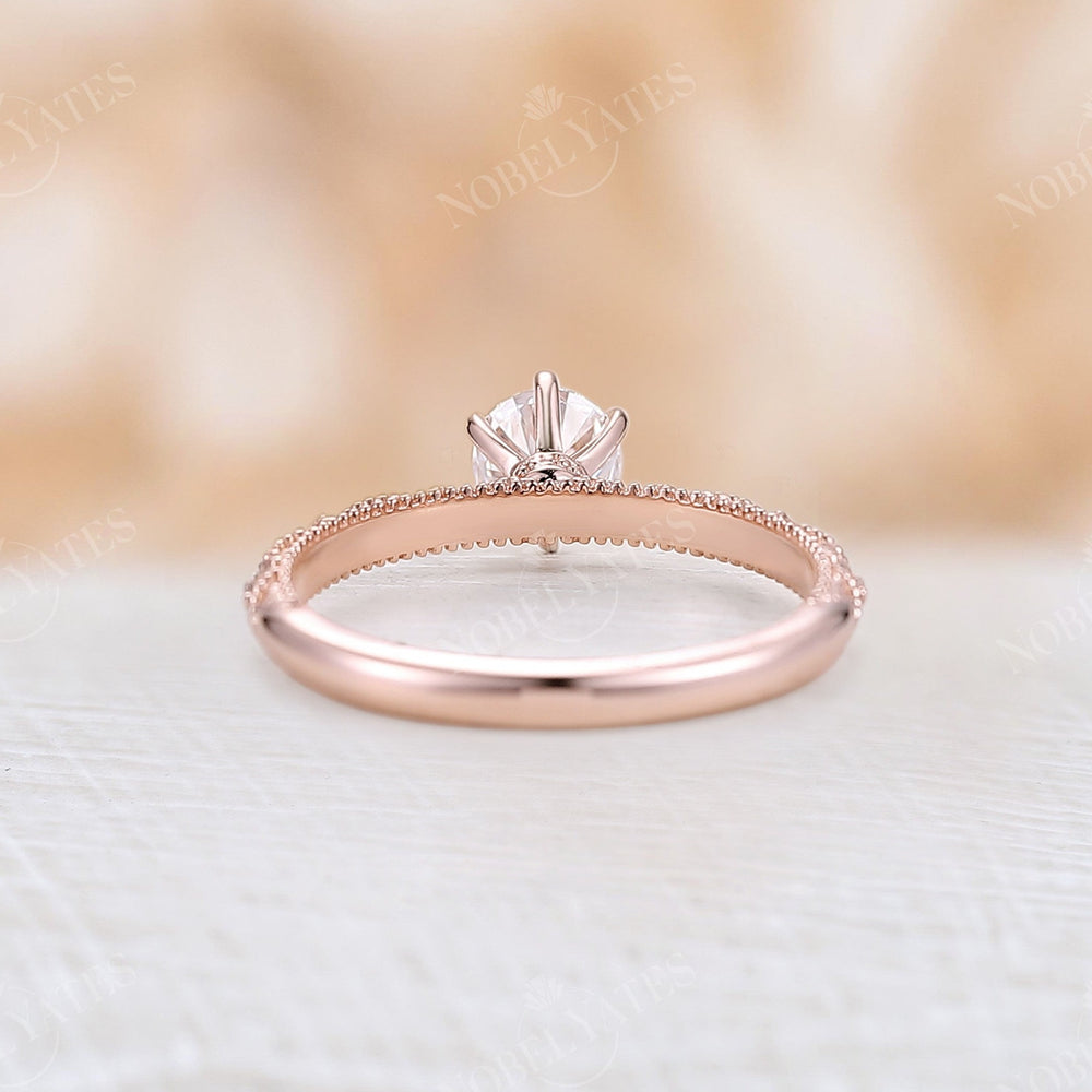 
                  
                    Vintage Round Moissanite Solitaire Engagement Ring Rose Gold
                  
                