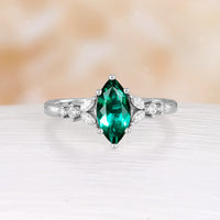 Marquise Shape Lab Emerald Side Stone Cluster Engagement Ring Rose Gold