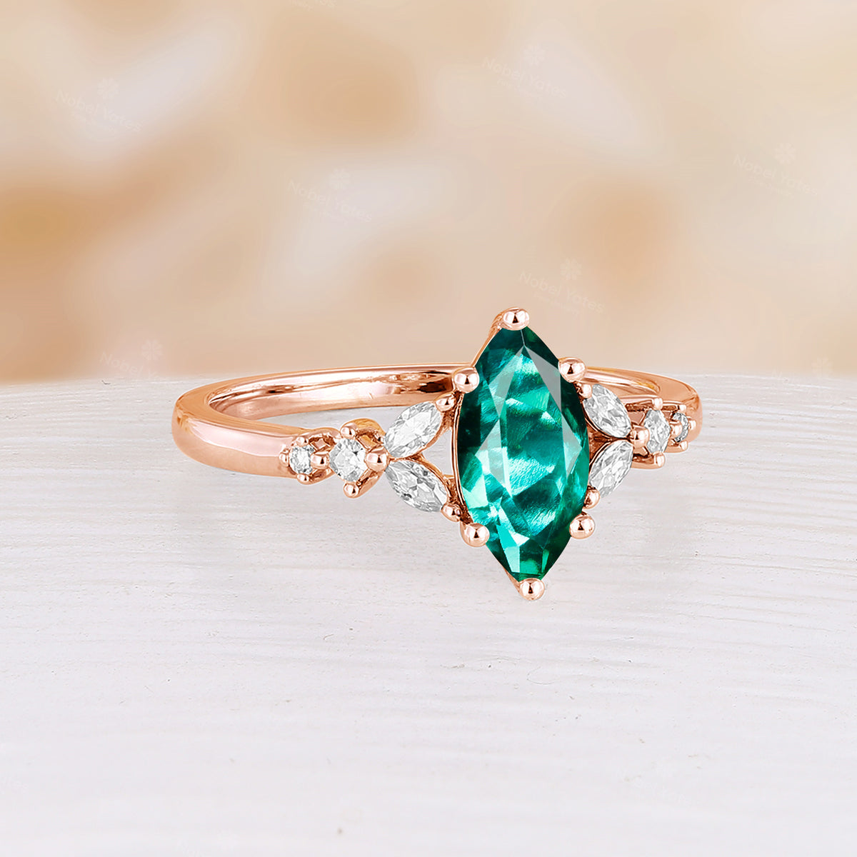 Marquise Shape Lab Emerald Side Stone Cluster Engagement Ring Rose Gold