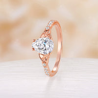 Celtic Inspired Pear Cut Moissanite Engagement Ring Rose Gold Pave Band