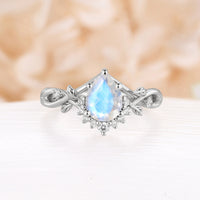 Nature Inspired Blue Moonstone Rose Gold Engagement Ring Twist Band