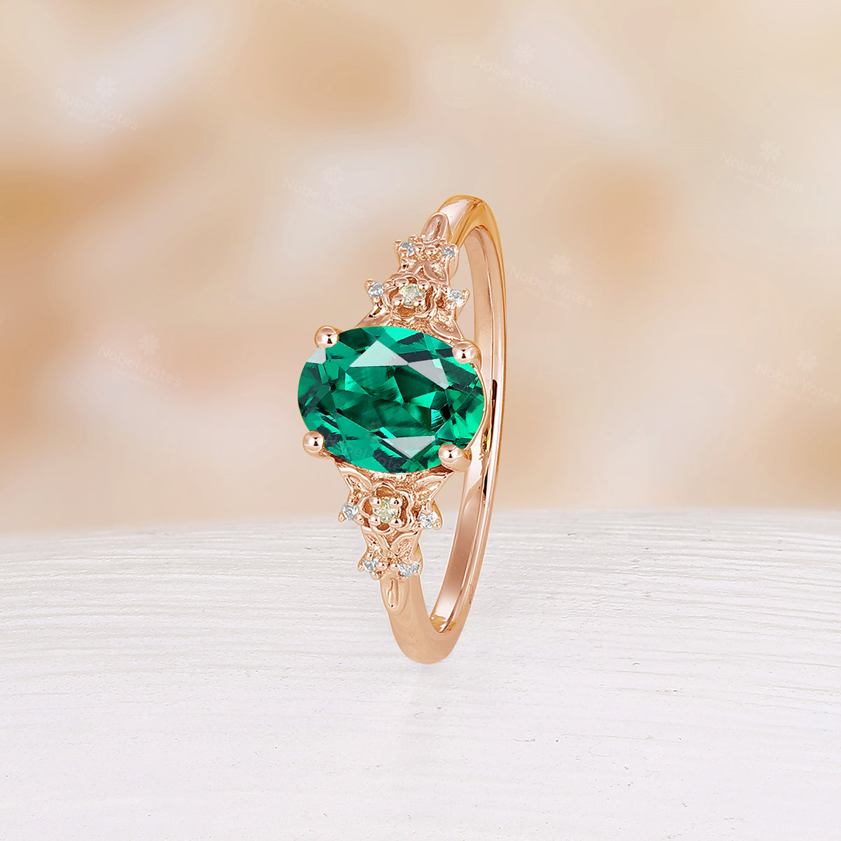 Nature Inspired Oval Cut Lab Emerald Foral Engagement Ring Rose Gold Side Stone