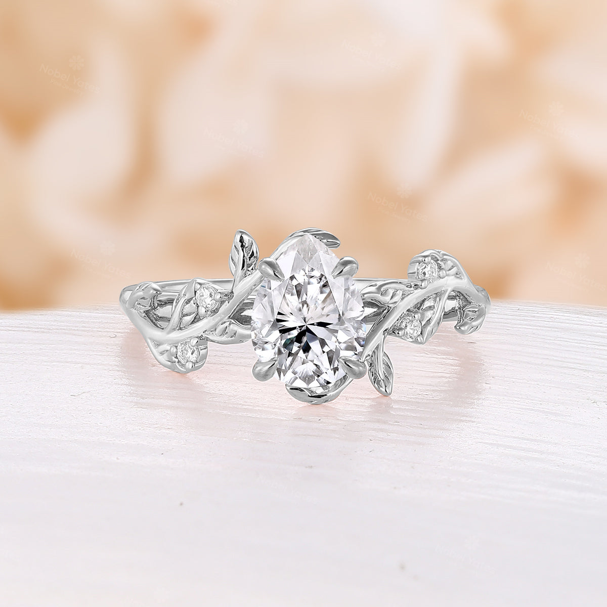 Nature Inspired Pear Moissanite Engagement Ring Rose Gold Bypass Leaf Band