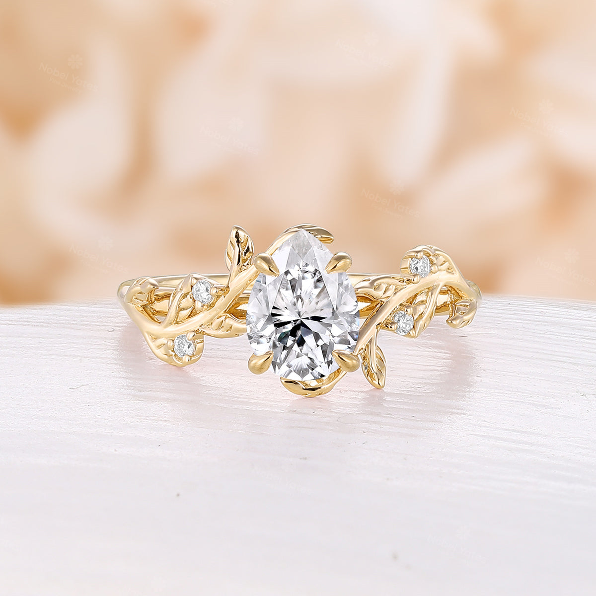 Nature Inspired Pear Moissanite Engagement Ring Rose Gold Bypass Leaf Band