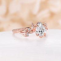 Nature Inspired Pear Moissanite Engagement Ring Rose Gold Bypass Leaf Band