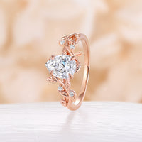 Nature Inspired Pear Moissanite Engagement Ring Rose Gold Bypass Leaf Band