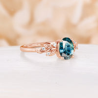 Nature Inspired Oval Cut Teal Sapphire Engagement Ring Leaf Design