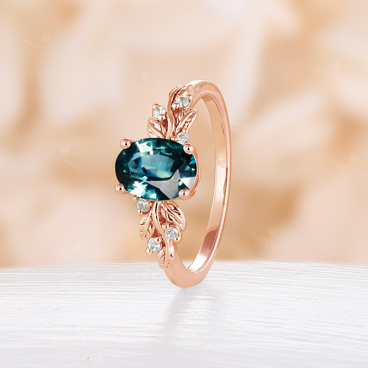 Nature Inspired Oval Cut Teal Sapphire Engagement Ring Leaf Design