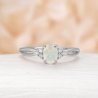 Oval Cut White Opal Engagement Ring Moissanite Side Stones Split Rose Gold Band