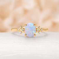 Natural White Opal Oval Shape Engagement Ring Yellow Gold Cluster Side Stone