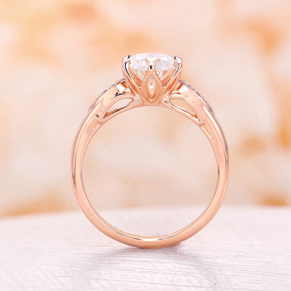
                  
                    Round Moissanite Rose Gold Floral Engagement Ring
                  
                
